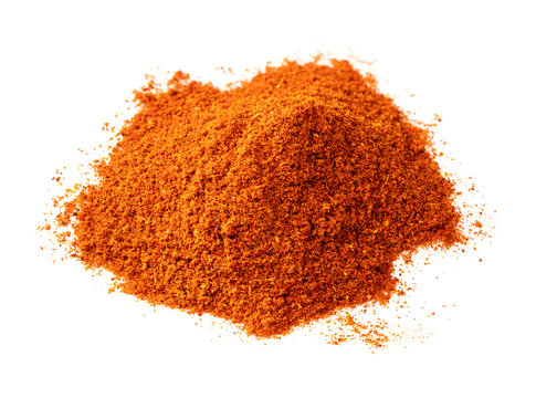 pile of chili powder from cayenne pepper on white