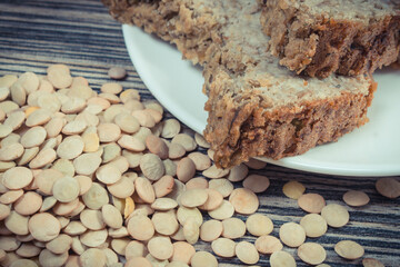 Green lentil seeds containing vitamins and fresh baked pate. Healthy eating