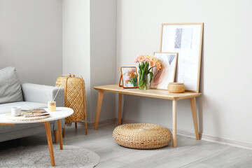 Bouquet of beautiful tulip flowers on table in interior of room