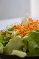 green leaf salad with carrots and lemon dressing