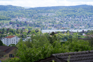 Fototapeta na wymiar Cityscape of Zurich at cloudy day at springtime. Photo taken May 22nd, 2021, Zurich, Switzerland.