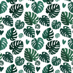 Seamless texture of green monstera leaves, foliage pattern, natural abstract background