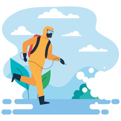 man outside disinfecting