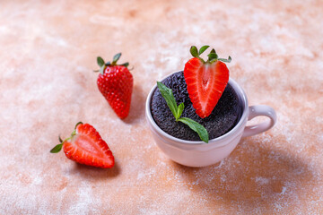 Delicious chocolate souffle with strawberries.