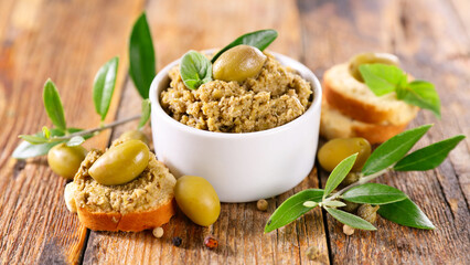 green olive spread and bread toast- tapenade