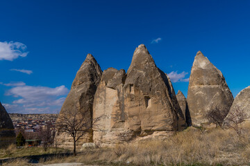 Fototapeta na wymiar Beautiful fairy chimneys and typical rock formations near Göreme, Cappadocia, Turkey
