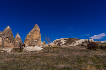 Panoramic view of fairy chimneys and typical rock formations near Göreme, Cappadocia, Turkey