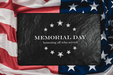 American flag on a black background with the text Memorial Day. The inscription memory and honor on a black background. American Holidays.