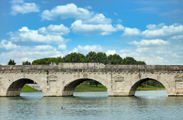 Fototapeta na wymiar Ancient stone Tiberius bridge in Rimini Italy