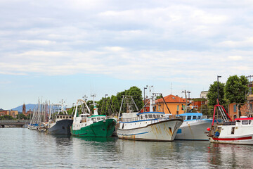 Fototapeta na wymiar Fishing boats on the Porto Canale Rimini Italy