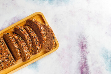 Fresh bread with sunflower seeds, sesame seeds and flax seeds.