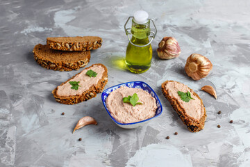 Fresh homemade chicken (duck,goose,rabbit,turkey) liver pate on whole grain bread with seeds.