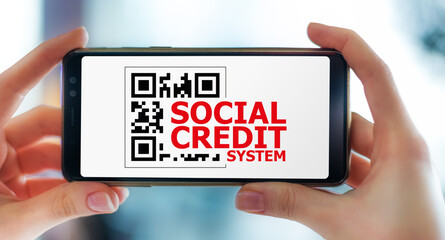 Smartphone displaying the sign of Social Credit System - obrazy, fototapety, plakaty