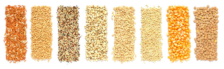 Collection of dry organic cereal and grain seeds bar consisted of rice, wheat, quinoa, job's tear, pearl barley, corn, and lentil seeds on white background