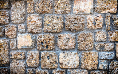 grey rough stone wall closeup, seamless pattern textured background