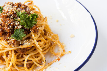 Home made Italian  spaghetti bolognese on white background