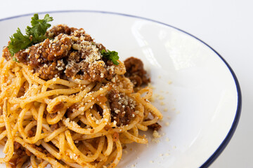 Home made Italian  spaghetti bolognese on white background