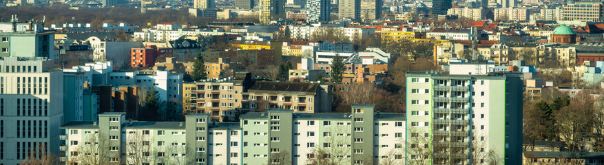 Naklejka premium Cityscape from above on residential buildings in Berlin. Panoramic view on housing market, rents, housing shortage or as background image.