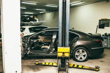 Fototapeta premium Car repair services of any complexity. car repair after an accident. Auto repair shop