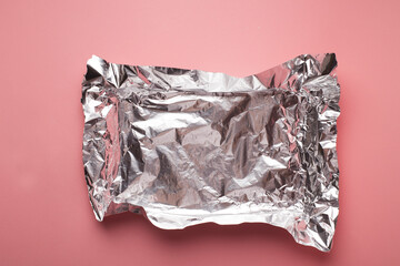 Aluminum foil for wrapping sandwich, glossy crumpled aluminium sheet, copy space