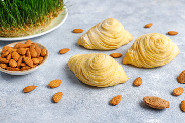 Traditional Azerbaijan holiday Novruz sweet badambura with almond.