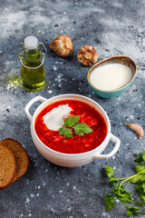 Traditional Ukrainian Russian borscht or red beetroot soup in the bowl.