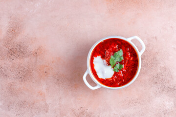 Traditional Ukrainian Russian borscht or red beetroot soup in the bowl.