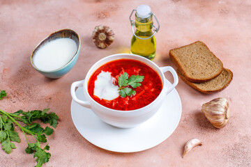 Traditional Ukrainian Russian borscht or red beetroot soup in the bowl.