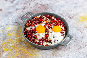 Traditional Azerbaijan cuisine pomegranate seeds with egg narnumru or nar numru.