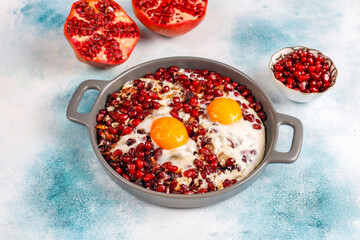 Traditional Azerbaijan cuisine pomegranate seeds with egg narnumru or nar numru.