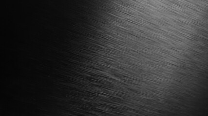 black metal texture background. aluminum brushed in silver color. close up hairline black stainless texture background for industrial or loft concept.
