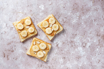 Sandwich with peanut butter and banana slices.