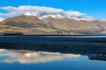 The Dart River in the South Island of New Zealand, and the mountains of the Southern Alps