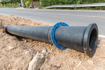Construction site with new Water Pipes in the ground. sewer pipes to repair or restore in street city