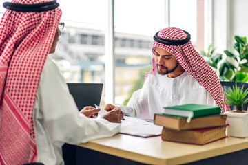 Successful of group collegue arab business people working with laptop computer and document report.Creative arabic business people meeting and planning strategy analysis with new startup idea project