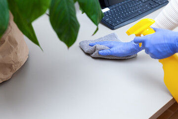 Disinfecting computer, antibacterial spray, rag, safe working from home