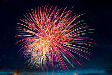 Fireworks on the background of the dark night sky. 4th July - American Independence Day