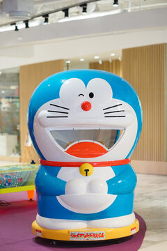 BKK, Thailand  - Apr 6, 2021 : A photo of Doraemon machine in Children's play zone at Emquatier. Doraemon is a famous robot cat character from Japan, created by Fukiko F, Fujio.