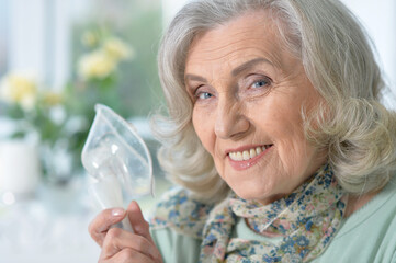 Portrait of sick senior woman
