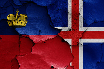 flags of Liechtenstein and Iceland painted on cracked wall