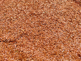 Flax seed brown colour background used for health and diet nutrition concept