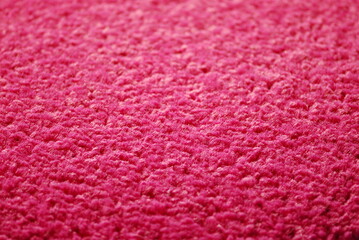 Close up of pink pile carpet