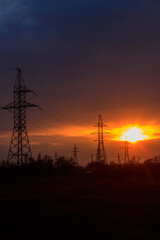 High voltage power line at sunset