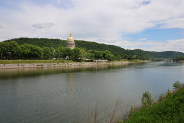 Fototapeta na wymiar The West Virginia Capitol viewed from across the Kanawha River from the University of Charleston.