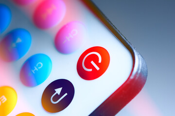 remote controller in multi-colored rays.