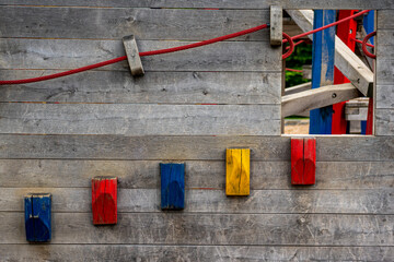 wooden wall with colorful wooden stairs