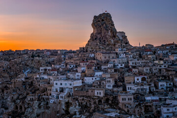 Town of Ortahisar at the sunset. Cappadocia, Turkey. February 2021