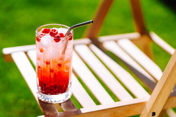 Refreshing summer alcoholic cocktail with ice and citrus fruits. Party, holiday concept.