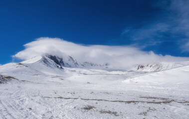 Fototapeta na wymiar Winter view of Erciyes mountain covered with snow in february 2021