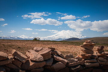 Elbrus And Green Hills with road At Sunny Summer Day. Dzhili-Su, Republic of Kabardino-Balkaria,North Caucasus, Russia.
